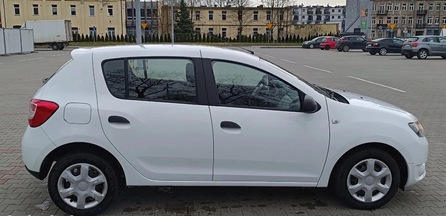 Dacia Sandero cena 23900 przebieg: 140512, rok produkcji 2014 z Ślesin małe 137